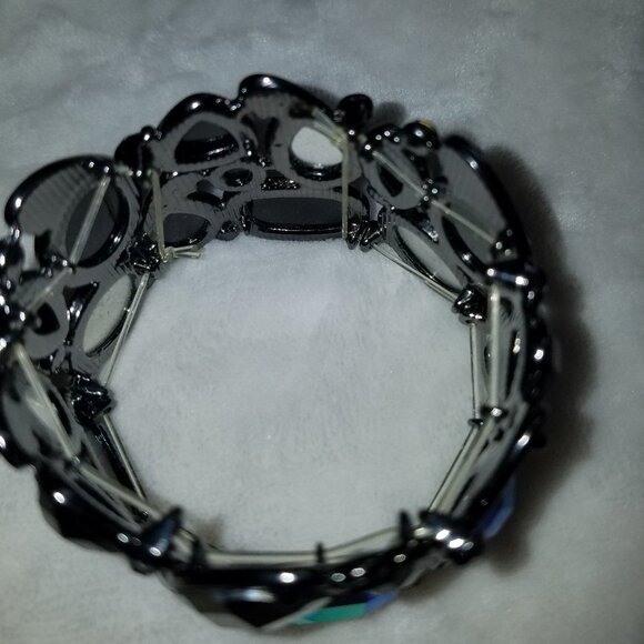 Free with $15 purchase 8" Stretchy black multi color bracelet plastic - Picture 2 of 4